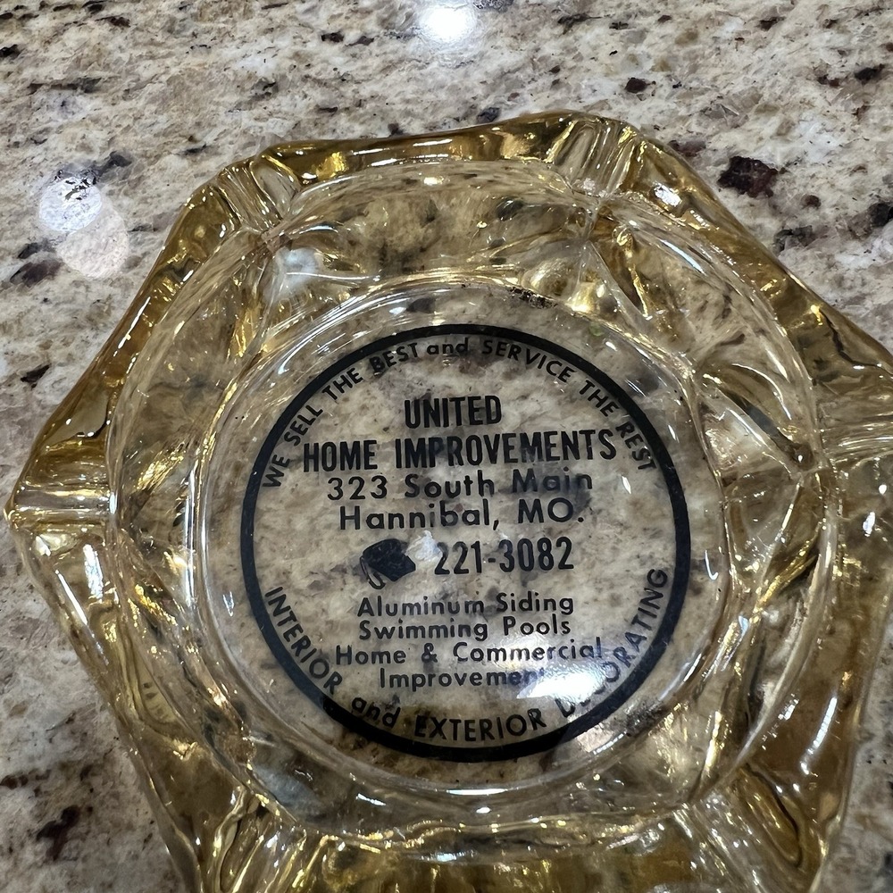 vintage-style glass ashtray advertising Hannibal MO. United Home Improvement